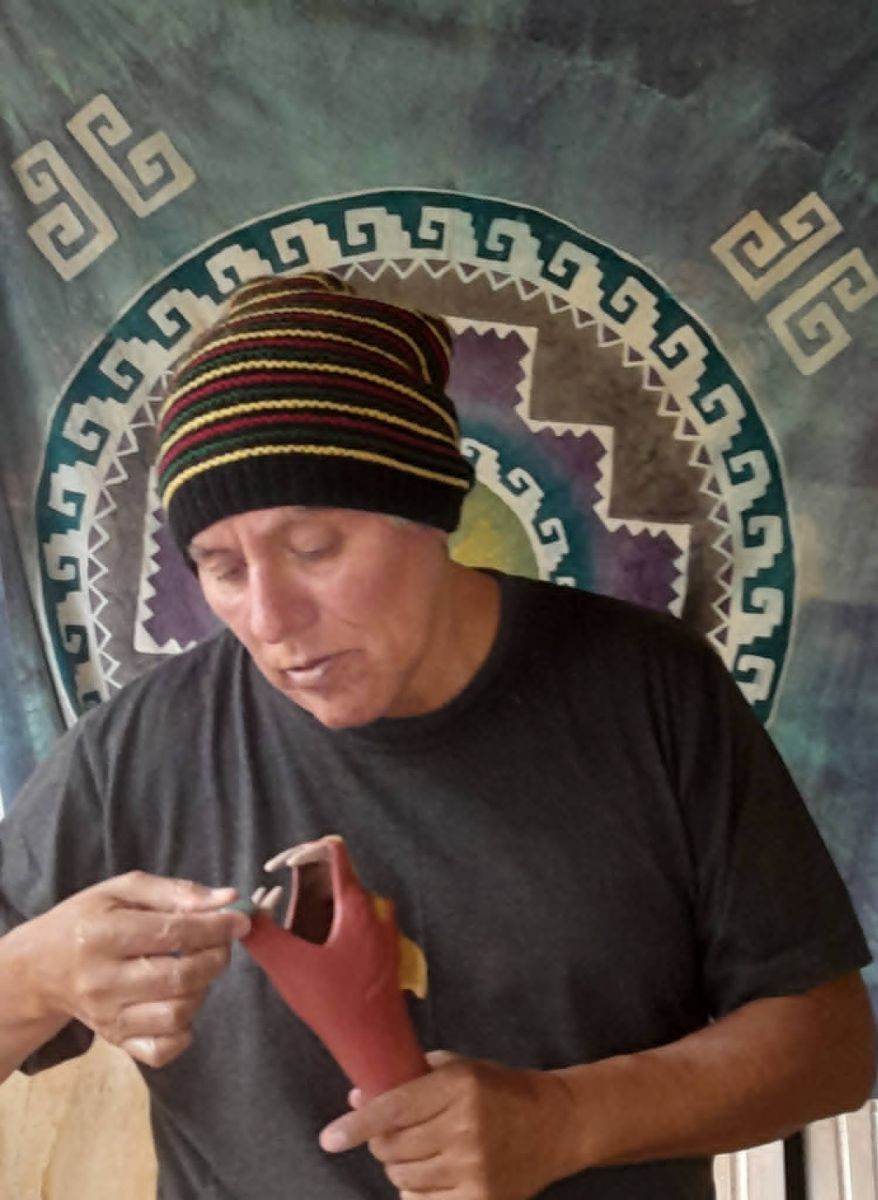 Alfredo burnishing an instrument